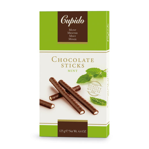 Jag Couture London New York Cupido dark chocolate mint sticks, close-up of chocolate-coated mint candies on sticks.
