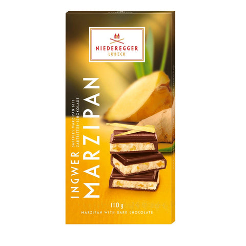Dark chocolate covered ginger-flavored marzipan bar by Jag Couture London - New York, with smooth chocolate coating and rich ginger marzipan center.