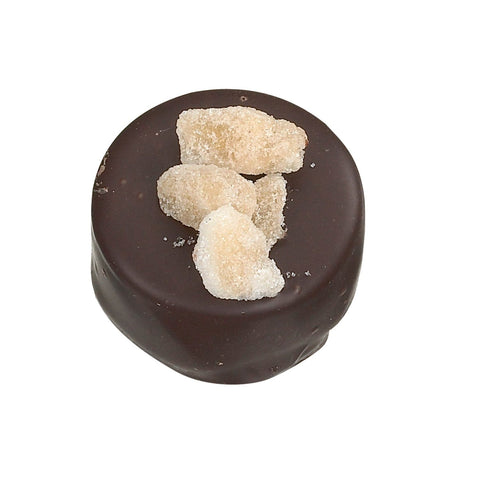 Dark ginger dark chocolate with ginger ganache and crystallized ginger decoration, from Jag Couture London and New York.