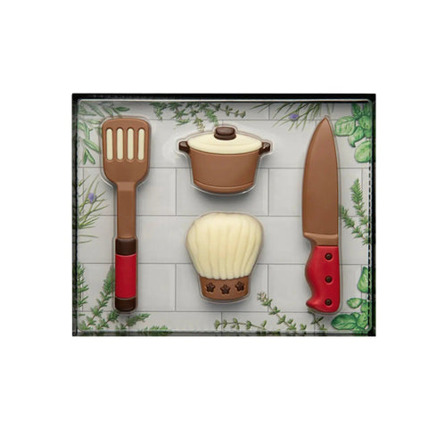 Decorated hollow milk chocolate cooking gift set by Jag Couture London New York, featuring detailed chocolate utensils and decorations.