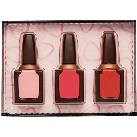 Decorated milk chocolate nail varnish set by Jag Couture London in a gift box, shown in a 105mm size.