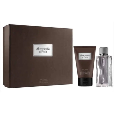 Abercrombie & Fitch First Instinct Man Eau De Toilette Spray 100ml set with two bottles, featuring sleek packaging and cologne bottles.