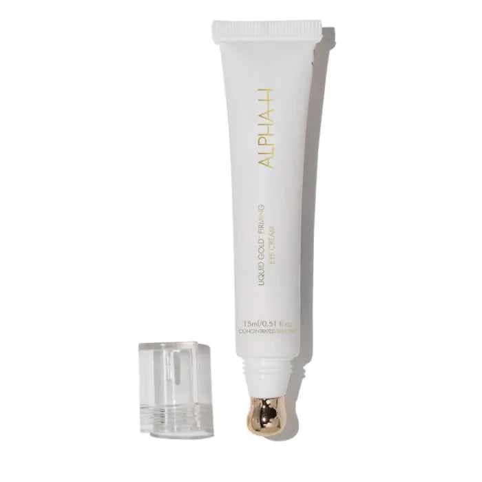 Alpha H Liquid Gold Firming Eye Cream in 15ml jar, showcasing smooth texture and elegant packaging from Jag Couture London.