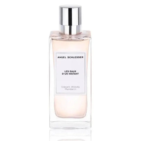 Angel Schlesser Les Eaux D’Un Instant Vibrant Woody Mandarin Eau De Toilette spray, 150ml, with fresh citrus and woody scent.
