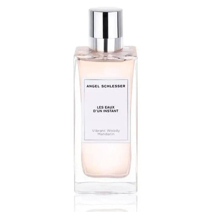 Angel Schlesser Les Eaux D’Un Instant Vibrant Woody Mandarin Eau De Toilette spray, 150ml, featuring a sleek bottle with vibrant orange accents.
