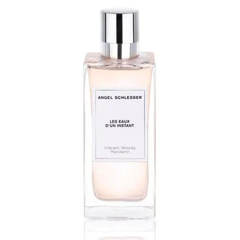 Angel Schlesser Les Eaux D’Un Instant Vibrant Woody Mandarin Eau De Toilette spray, 150ml, featuring a sleek bottle with vibrant orange accents.