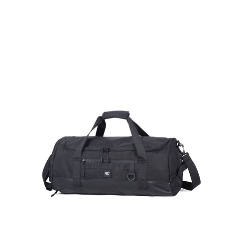 Aoking XW3024-5 black handbag by Jag Couture London New York with sleek design and gold hardware, displayed on a neutral background.
