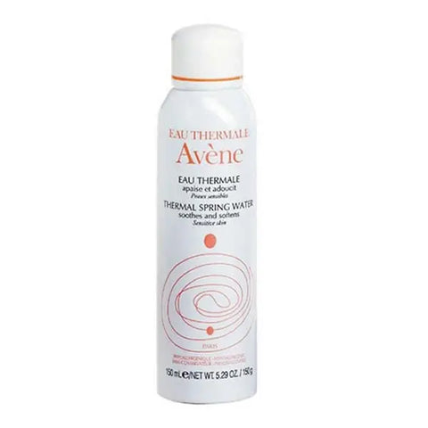 Avene Thermal Spring Water Spray 150ml bottle with blue and white label, held in hand against a neutral background.