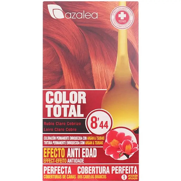 Jag Couture London-New York Azalea Color Total 8/44 Light Blonde Hair with Copper tones showing vibrant, layered hairstyle.