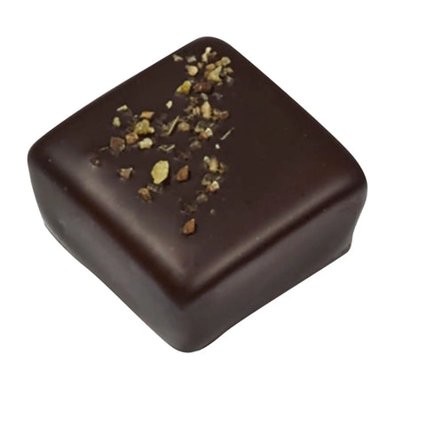 Dark chocolate lemon ganache by Jag Couture London, elegant 12g treat with rich chocolate and zesty lemon flavor.