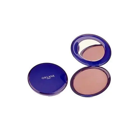 Jag Couture London - New York Bronzing Pressed Powder Cuivré 2 in compact, showcasing a warm, sun-kissed bronzing powder.