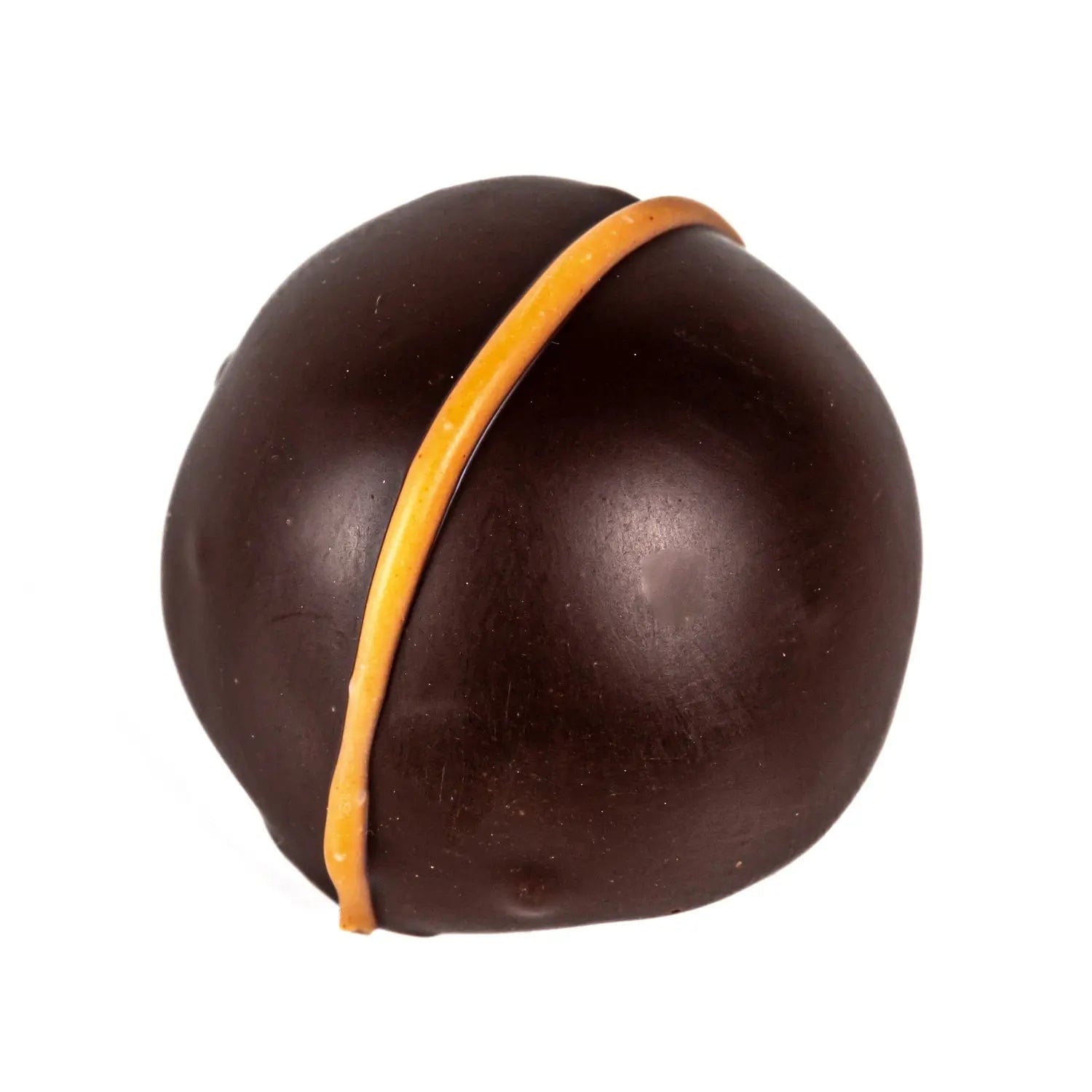 Dark chocolate cup filled with Bucks Fizz Marc de Champagne and orange crème fraîche, by Jag Couture London New York.