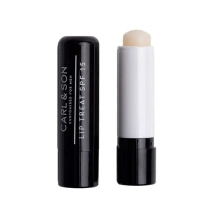 Jag Couture London Carl & Son Lip Treat SPF15 in transparent 4.5g, showing the sleek lip balm tube with product label.