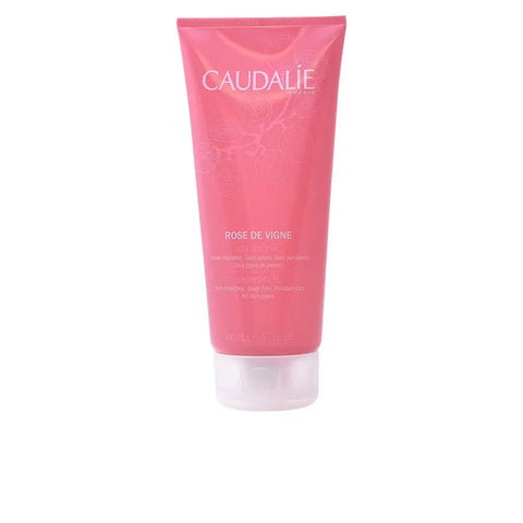 Caudalie Rose De Vigne Shower Gel 200ml in a clear bottle with a pink floral label, displayed on a neutral background.