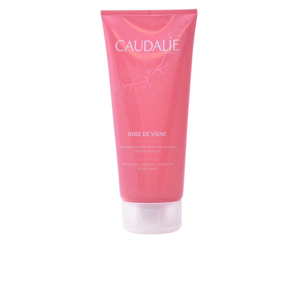 Caudalie Rose De Vigne Shower Gel in a 200ml bottle, featuring a floral rose design, displayed on a bathroom shelf.