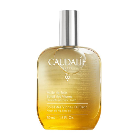 Caudalie Soleil Des Vignes Treatment Oil 50ml, a luxurious skincare oil with a golden hue and elegant packaging.