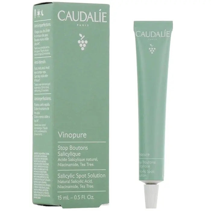Caudalie Vinopure Salicylic Spot Solution 15ml, clear bottle with dropper for blemish treatment and skincare.