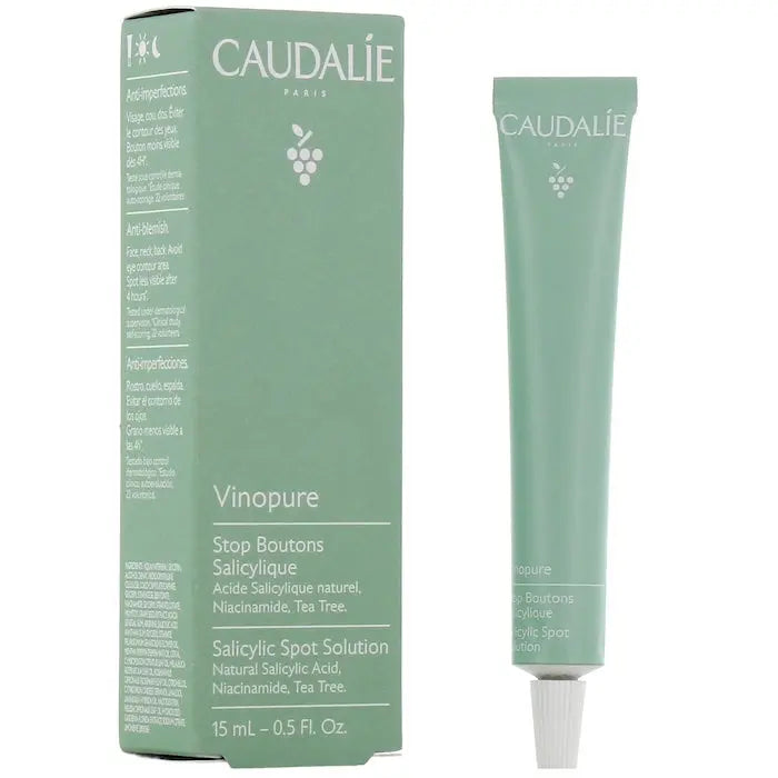 Caudalie Vinopure Salicylic Spot Solution in 15ml bottle, designed for targeted blemish treatment on clear skin