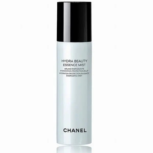 Chanel Hydra Beauty Essence Mist 48g bottle with clear spray nozzle, skincare product on a neutral background.