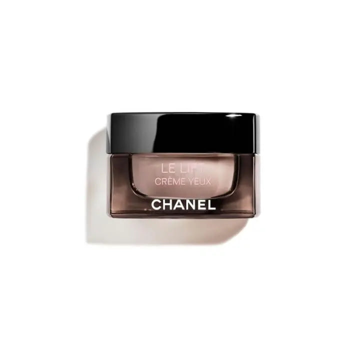 Chanel Le Lift Crème Yeux 15ml jar, anti-aging eye cream with luxurious formula, displayed on a sleek surface.