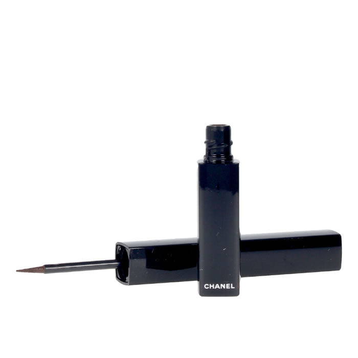 Chanel Le Liner De Chanel Liquid Eyeliner in 514 Ultra Brun, black liquid eyeliner with precise applicator on a neutral background