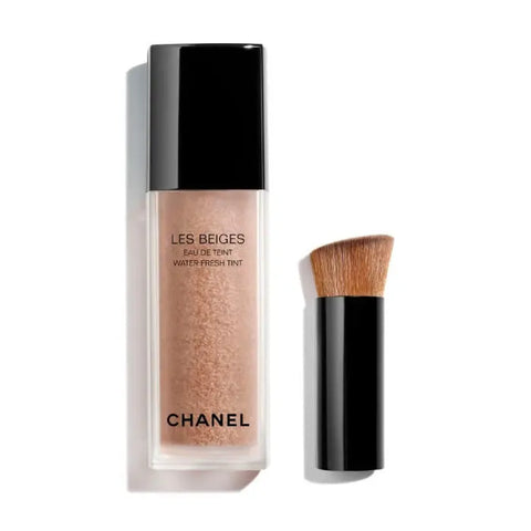 Chanel Les Beiges Eau De Teint Medium Light 30ml bottle, natural makeup foundation with a sleek design and beige cap.