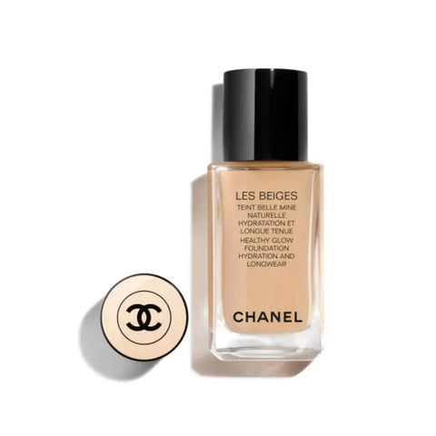 Chanel Les Beiges Foundation BD41 30ml bottle with beige cap and sleek packaging, held in hand for makeup application.