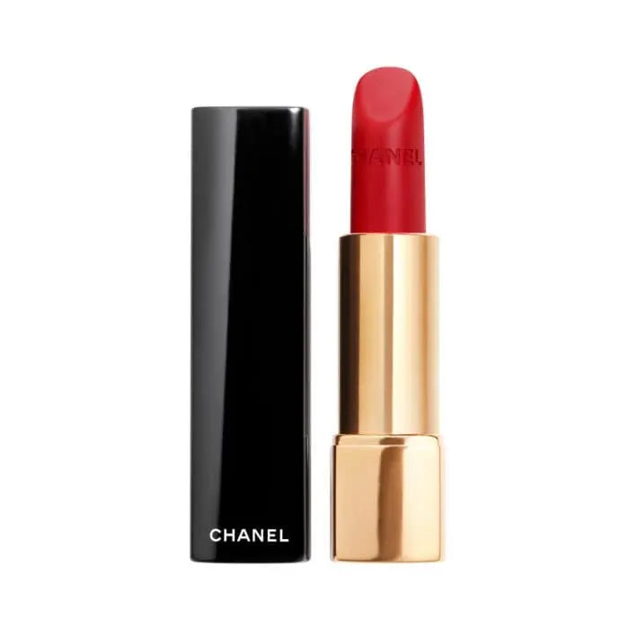 Chanel Rouge Allure Velvet luminous matte lip color in shade 56 Rouge Charnel, showcasing a velvety lipstick application on lips.