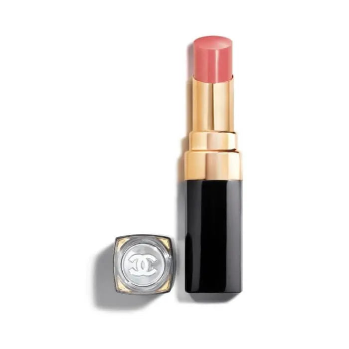 Chanel Rouge Coco Flash 84 Inmediat lipstick in sleek black tube, showcasing vibrant coral shade with shiny finish.