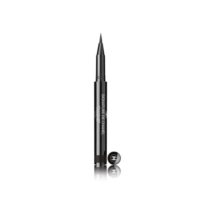 Chanel Signature De Chanel Stylo Eyeliner in 10 Noir, sleek black liquid eyeliner pen with a fine tip, from Jag Couture London New York