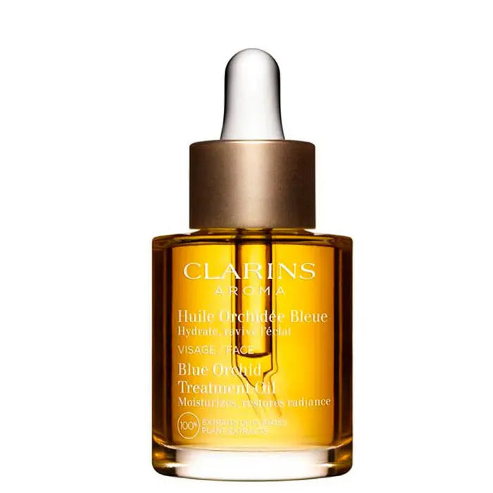 Clarins Blue Orchid Face Treatment Oil for dehydrated skin, 30ml, with a dropper bottle and blue orchid flowers in the background.