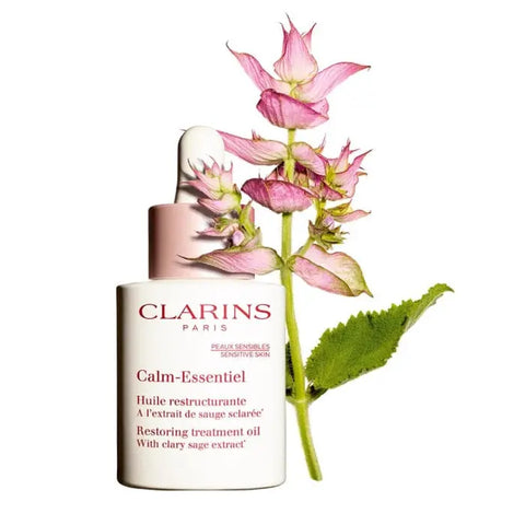 Clarins Calm-Essentiel Restoring Treatment Oil 30ml, natural skincare oil with calming properties, shown in a clear bottle.