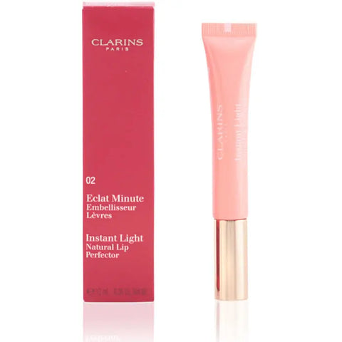 Clarins Instant Light Natural Lip Perfector 02 Apricot Shimmer, lip gloss with a shimmering apricot hue, by Jag Couture London New York