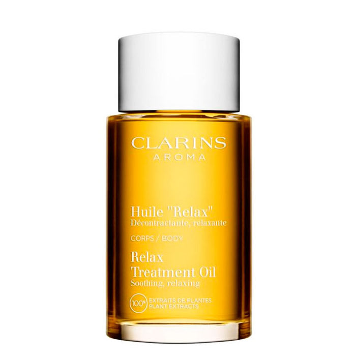 Jag Couture London New York Clarins Relax Treatment Oil in 100ml bottle, showcasing the elegant packaging and product label.