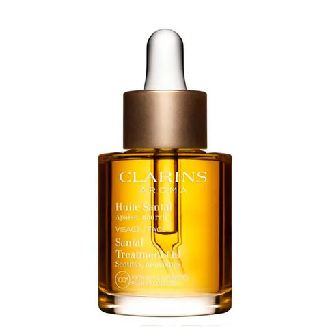 Clarins Santal Treatment Oil for dry skin in 30ml bottle, featuring natural sandalwood scent, by Jag Couture London New York
