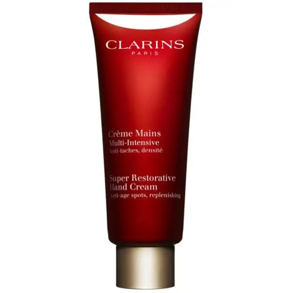 Jag Couture London New York Clarins Super Restorative Age-Control Hand Cream in 100ml tube, featuring a sleek design