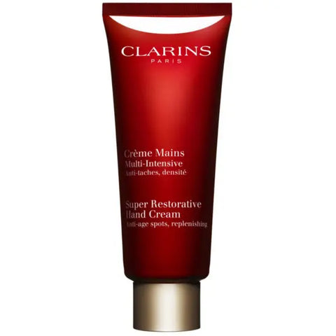 Jag Couture London - New York Clarins Super Restorative Age-Control Hand Cream in 100ml tube, showing smooth, youthful-looking hands.