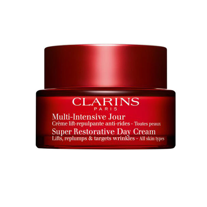 Clarins Super Restorative Day Cream for all skin types in 50ml jar, shown with sleek packaging and product label.