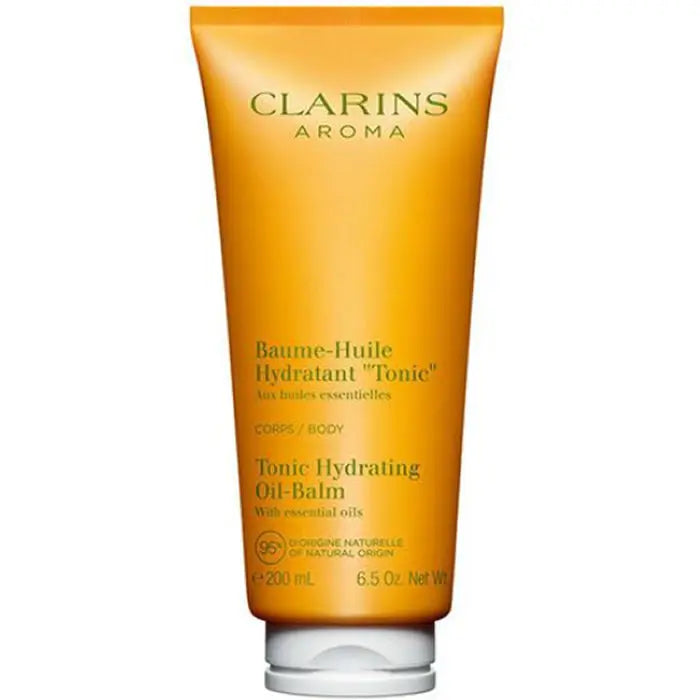 Jag Couture London - New York Clarins Tonic Moisturising Balm 200ml jar, smooth texture, and sleek packaging.