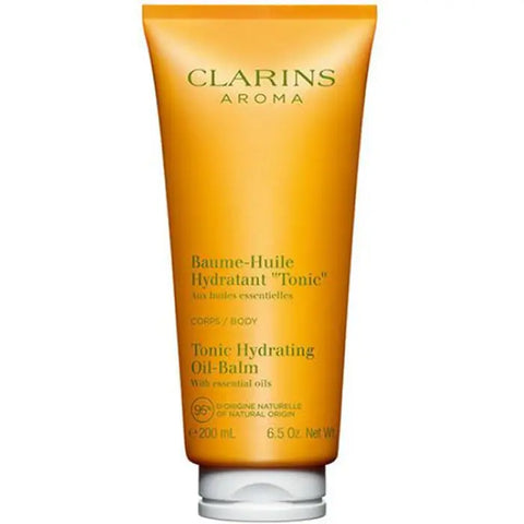 Jag Couture London - New York Clarins Tonic Moisturising Balm 200ml jar, smooth texture, and sleek packaging.