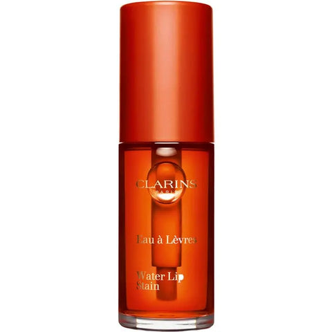 Clarins Water Lip Stain in shade 02 Orange Water, a vibrant lip color from Jag Couture London - New York.