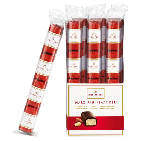 Dark chocolate-covered bite-sized marzipan loaves in flow-wrapped stick pack by Jag Couture London - New York