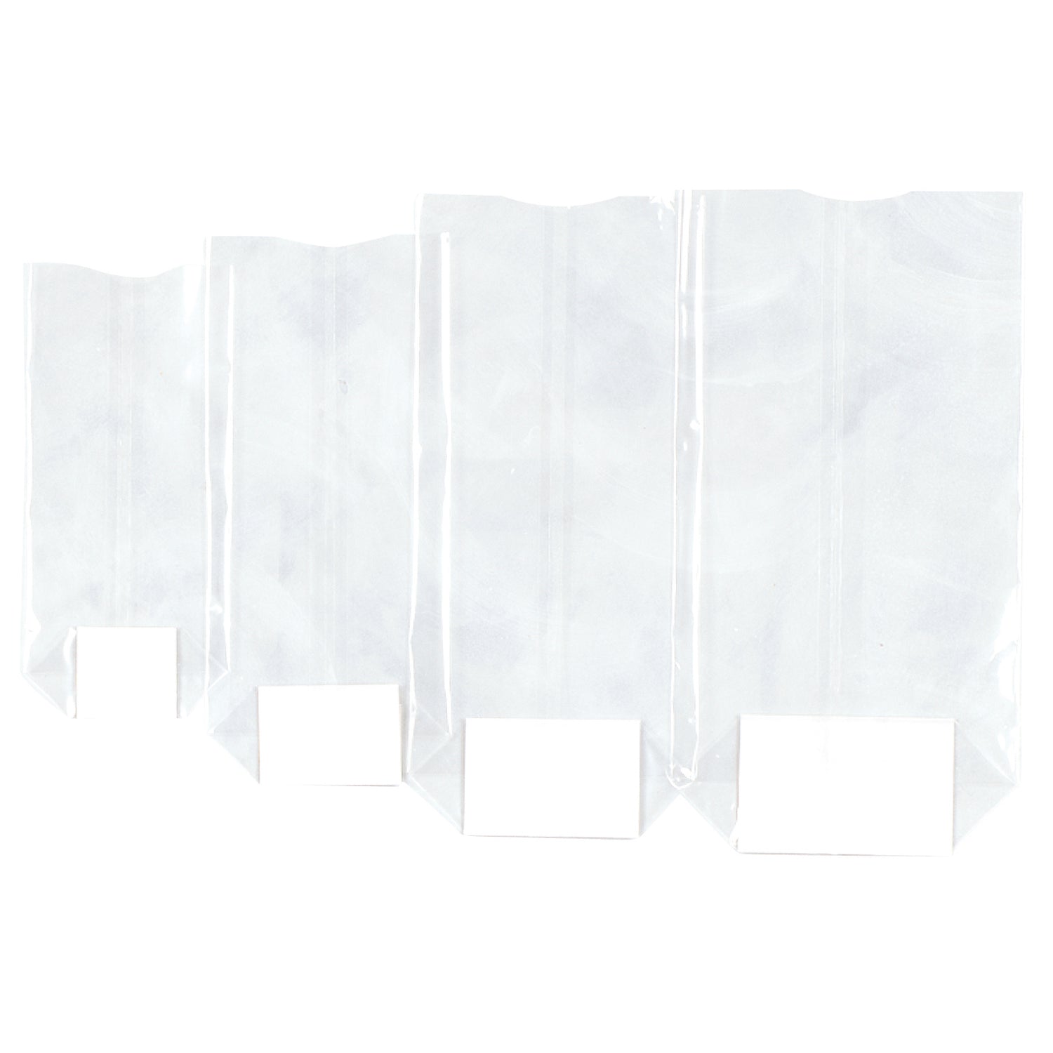 Clear block-bottomed cello bags by Jag Couture London New York, 140 x 305mm, showing transparent packaging for gifts or products.