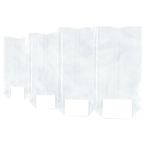 Clear block-bottomed cello bags by Jag Couture London New York, 140 x 305mm, showing transparent packaging for gifts or products.