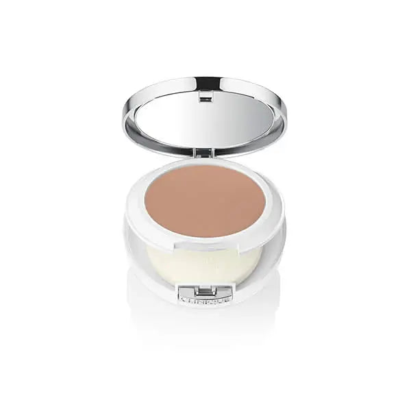 Clinique Beyond Perfecting Powder Foundation Concealer in shade 06 Ivory, with compact packaging and applicator brush.
