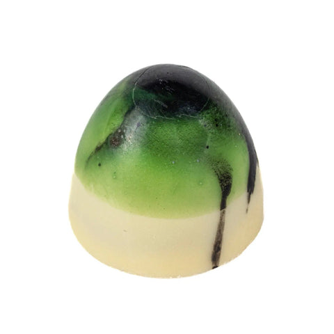 White chocolate Coconut Bullet by Jag Couture London, featuring milk chocolate coconut and lime ganache, 10g.