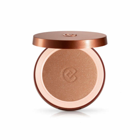Jag Couture London Silk Effect Bronzing Powder with 9 Sun Crystals shimmer, showcasing a luxurious compact with radiant bronzing and shimmer.