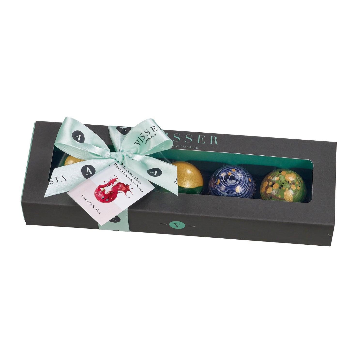 Deluxe gift box of 5 boozy Picasso chocolates from Jag Couture London - New York, with menu tag, displayed on a white surface.