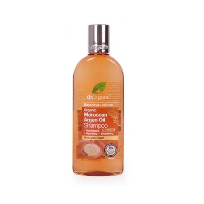 Bottle of Dr.Organic Moroccan Argan Oil Shampoo in 265ml size, with branding from Jag Couture London and New York.