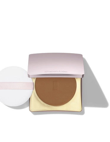 Elizabeth Arden Maq Powder Flawless Finish Skincare product displayed in a sleek compact with a mirror inside.